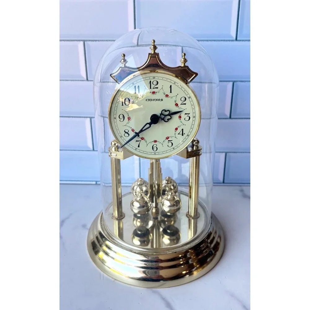 Chronos Quartz Anniversary Clock Gold Tone Glass Dome Floral Face Rotating Ball